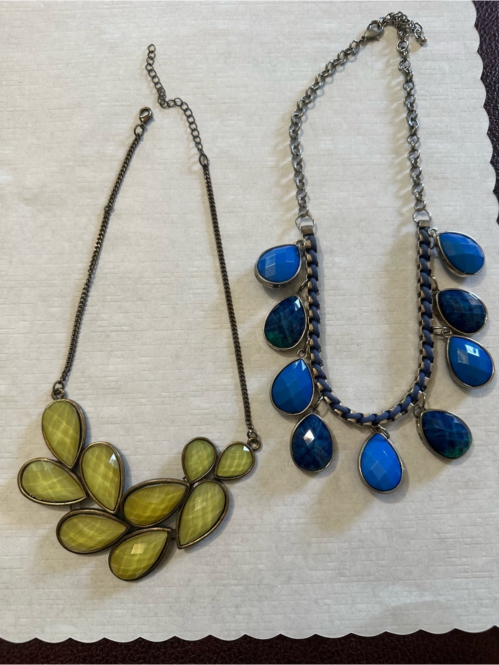 Blue Teardrop Statement Necklace and green faceted necklace